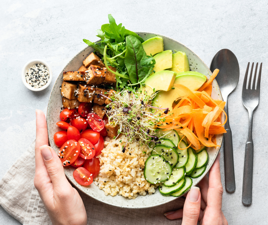 gentle nutrition and pregnancy, intuitive eating principles, plate is shown with colorful vegetables and tofu and rice